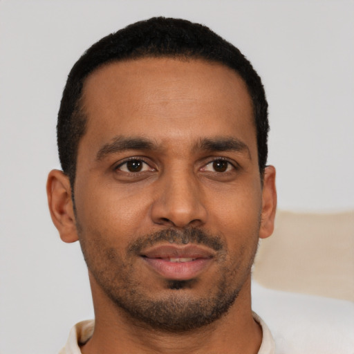 Neutral black young-adult male with short  brown hair and brown eyes