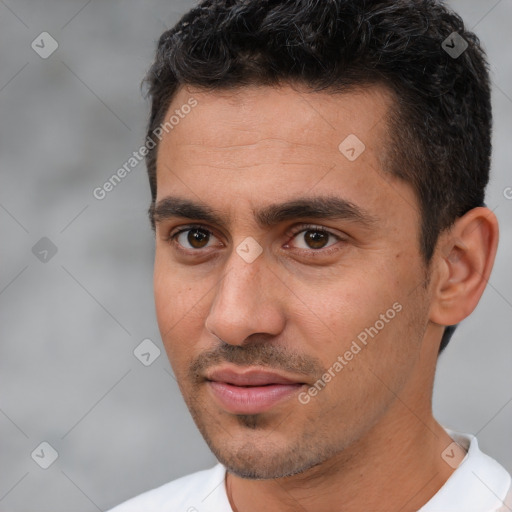 Joyful white adult male with short  brown hair and brown eyes