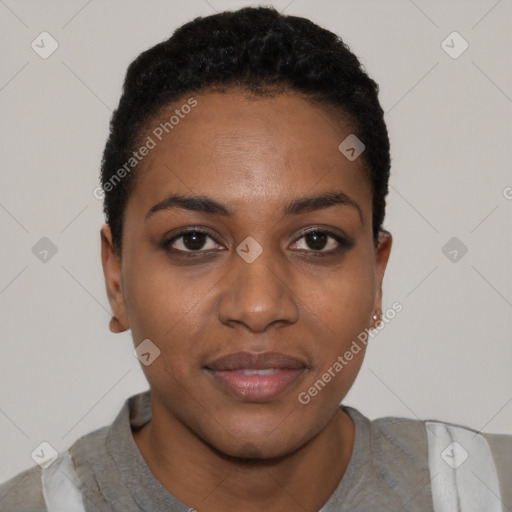 Joyful black young-adult female with short  black hair and brown eyes