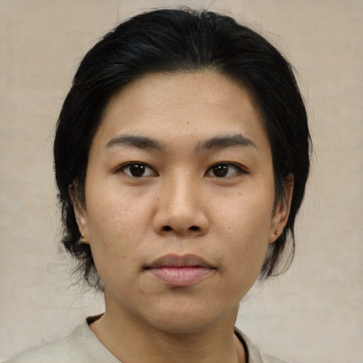 Neutral asian young-adult female with medium  black hair and brown eyes