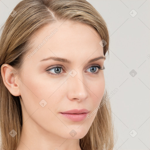 Neutral white young-adult female with long  brown hair and blue eyes