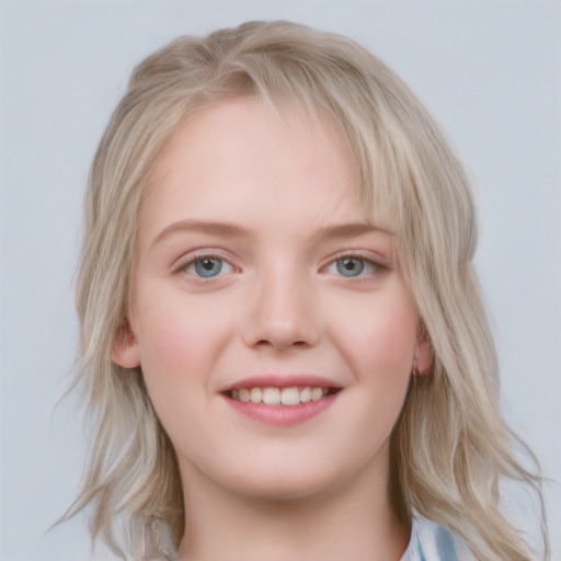 Joyful white young-adult female with medium  blond hair and blue eyes