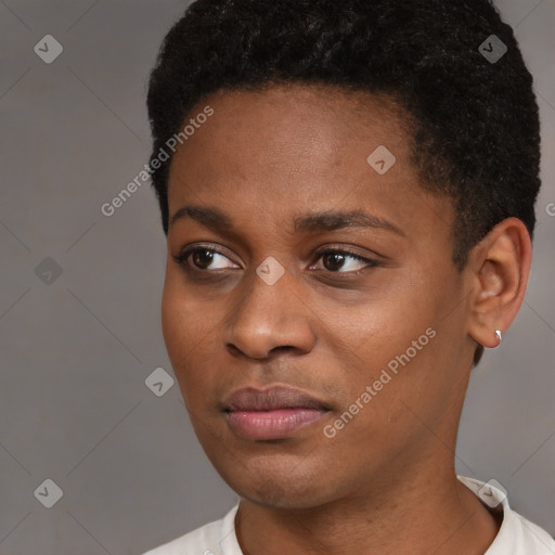 Joyful black young-adult female with short  brown hair and brown eyes