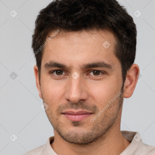 Joyful white young-adult male with short  brown hair and brown eyes