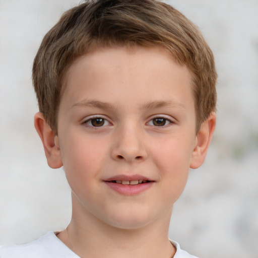 Joyful white child male with short  brown hair and brown eyes