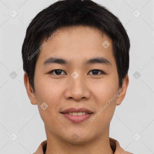 Joyful asian young-adult male with short  brown hair and brown eyes