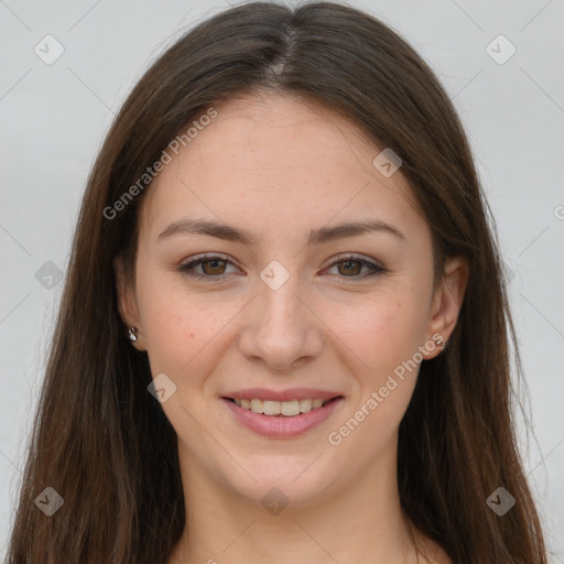 Joyful white young-adult female with long  brown hair and grey eyes