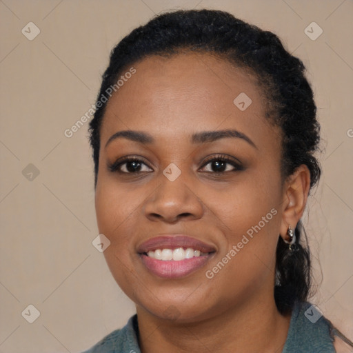 Joyful black young-adult female with medium  black hair and brown eyes