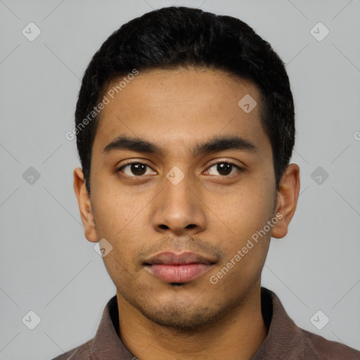 Neutral latino young-adult male with short  black hair and brown eyes