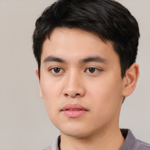 Neutral white young-adult male with short  black hair and brown eyes
