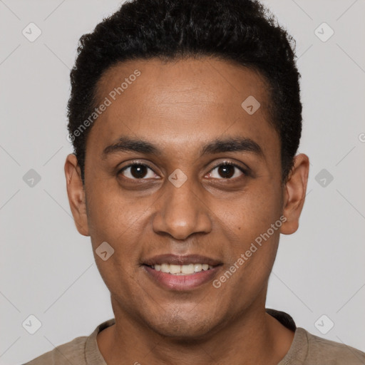 Joyful black young-adult male with short  black hair and brown eyes