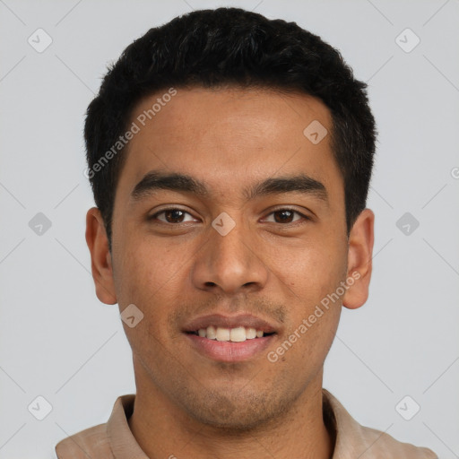 Joyful latino young-adult male with short  black hair and brown eyes