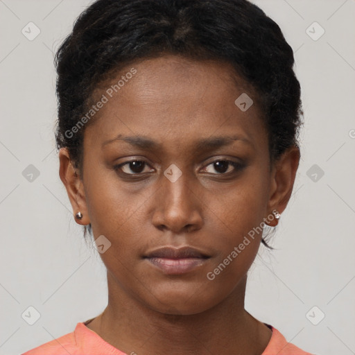 Neutral black young-adult female with short  brown hair and brown eyes