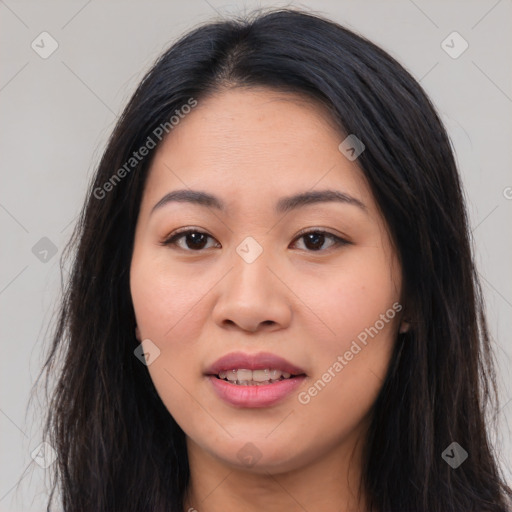 Joyful asian young-adult female with long  brown hair and brown eyes