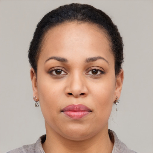 Neutral latino young-adult female with short  black hair and brown eyes