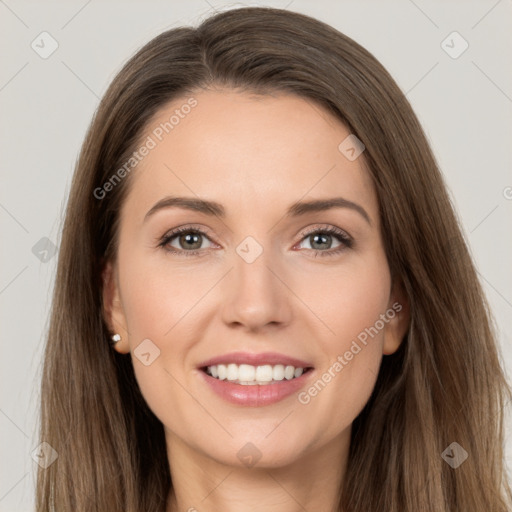 Joyful white young-adult female with long  brown hair and brown eyes