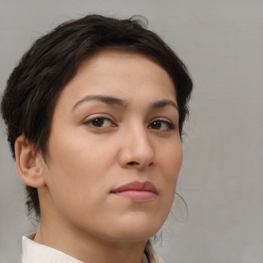 Neutral white young-adult female with medium  brown hair and brown eyes