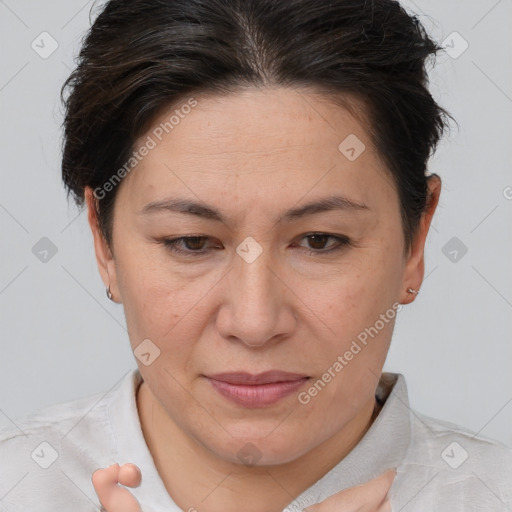 Joyful white adult female with short  brown hair and brown eyes