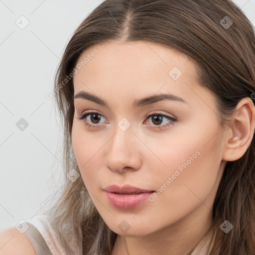 Neutral white young-adult female with long  brown hair and brown eyes