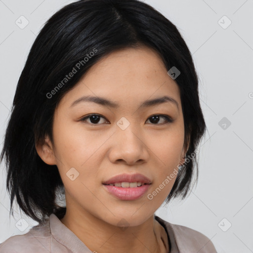 Joyful asian young-adult female with medium  black hair and brown eyes