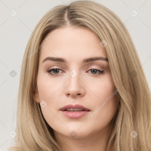 Neutral white young-adult female with long  brown hair and brown eyes