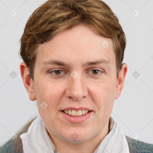 Joyful white adult male with short  brown hair and grey eyes