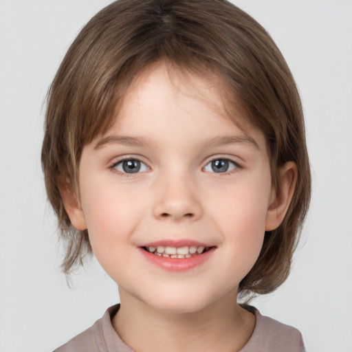 Joyful white child female with medium  brown hair and grey eyes