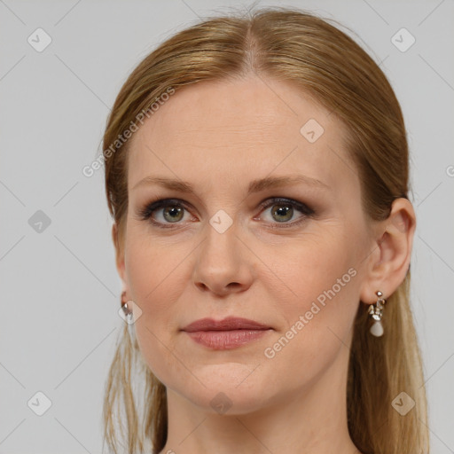 Joyful white young-adult female with long  brown hair and blue eyes