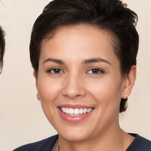 Joyful white young-adult female with medium  brown hair and brown eyes