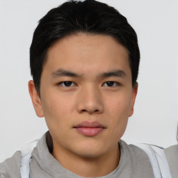 Neutral asian young-adult male with short  brown hair and brown eyes