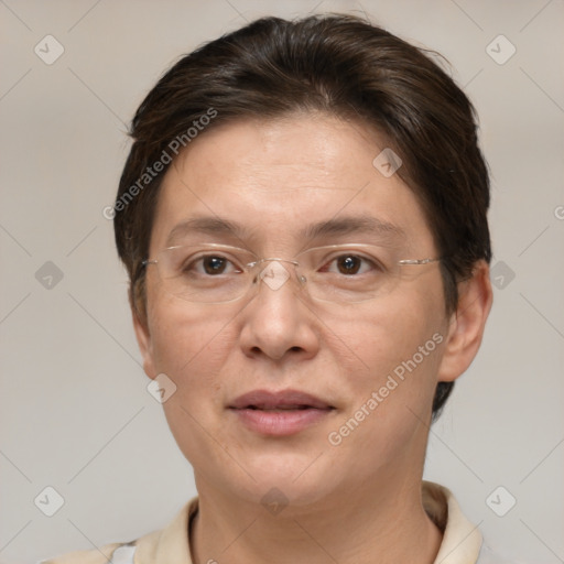 Joyful white adult female with short  brown hair and brown eyes