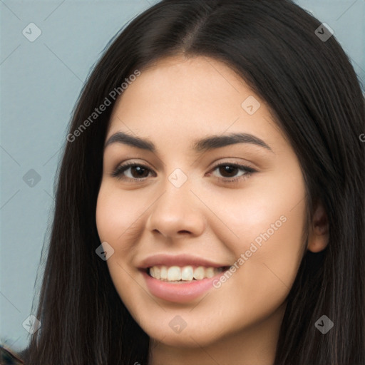 Joyful latino young-adult female with long  brown hair and brown eyes