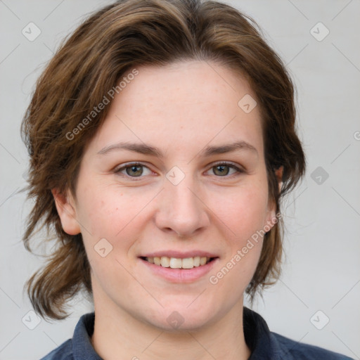 Joyful white young-adult female with medium  brown hair and blue eyes