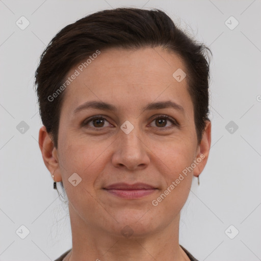 Joyful white adult female with short  brown hair and brown eyes