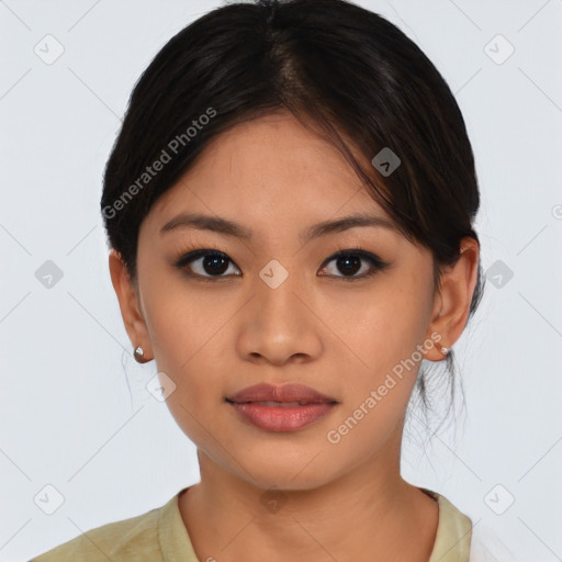 Joyful asian young-adult female with medium  brown hair and brown eyes