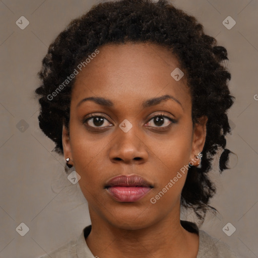 Neutral black young-adult female with medium  black hair and brown eyes