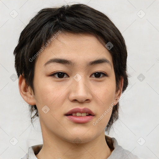 Joyful asian young-adult female with medium  brown hair and brown eyes