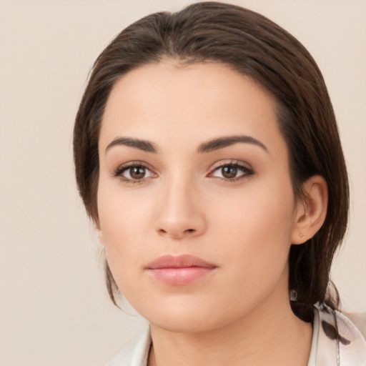 Neutral white young-adult female with medium  brown hair and brown eyes