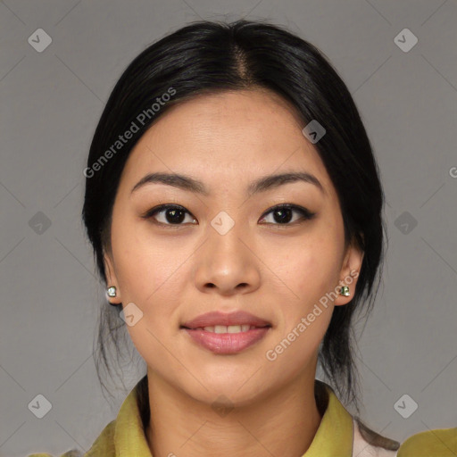 Joyful asian young-adult female with medium  black hair and brown eyes