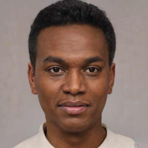 Neutral black young-adult male with short  black hair and brown eyes