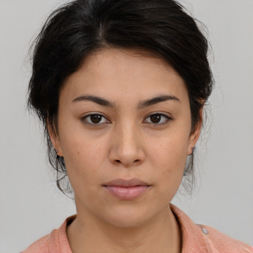 Neutral asian young-adult female with medium  brown hair and brown eyes