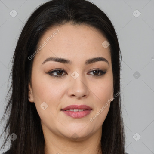 Joyful latino young-adult female with long  brown hair and brown eyes