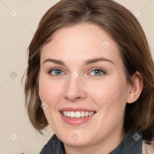 Joyful white young-adult female with medium  brown hair and blue eyes