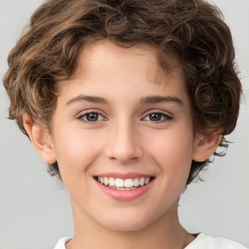 Joyful white child female with medium  brown hair and brown eyes