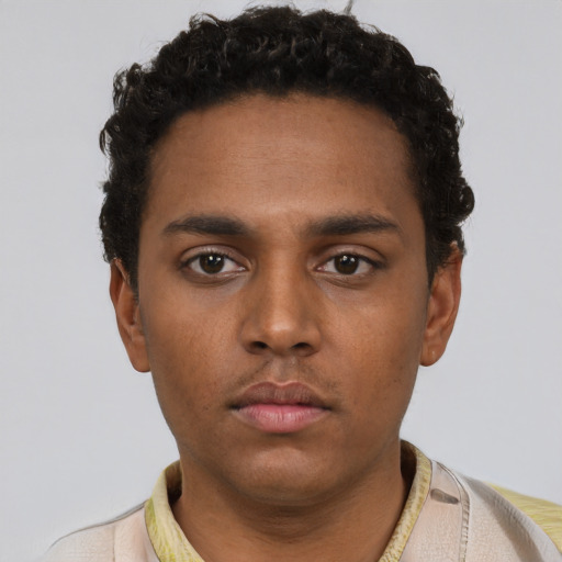 Neutral black young-adult male with short  black hair and brown eyes