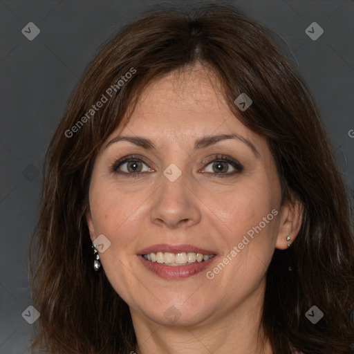 Joyful white adult female with medium  brown hair and brown eyes