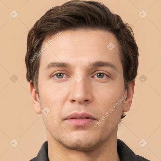 Neutral white young-adult male with short  brown hair and brown eyes