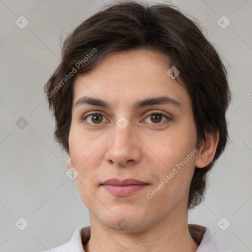 Joyful white adult female with medium  brown hair and brown eyes