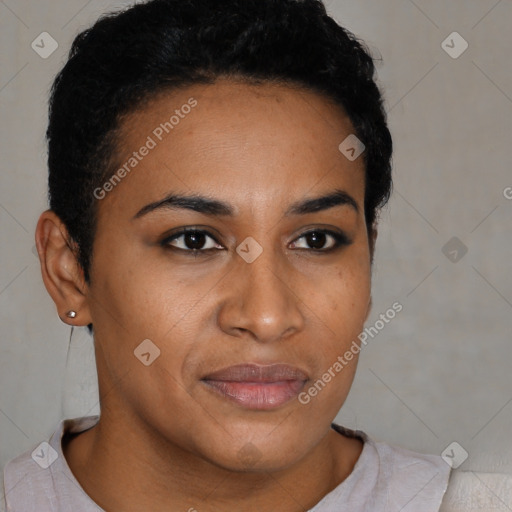 Joyful latino young-adult female with short  black hair and brown eyes