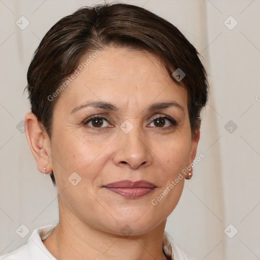 Joyful white adult female with short  brown hair and brown eyes